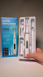 Aparat ultrasonic pentru curățarea dinților