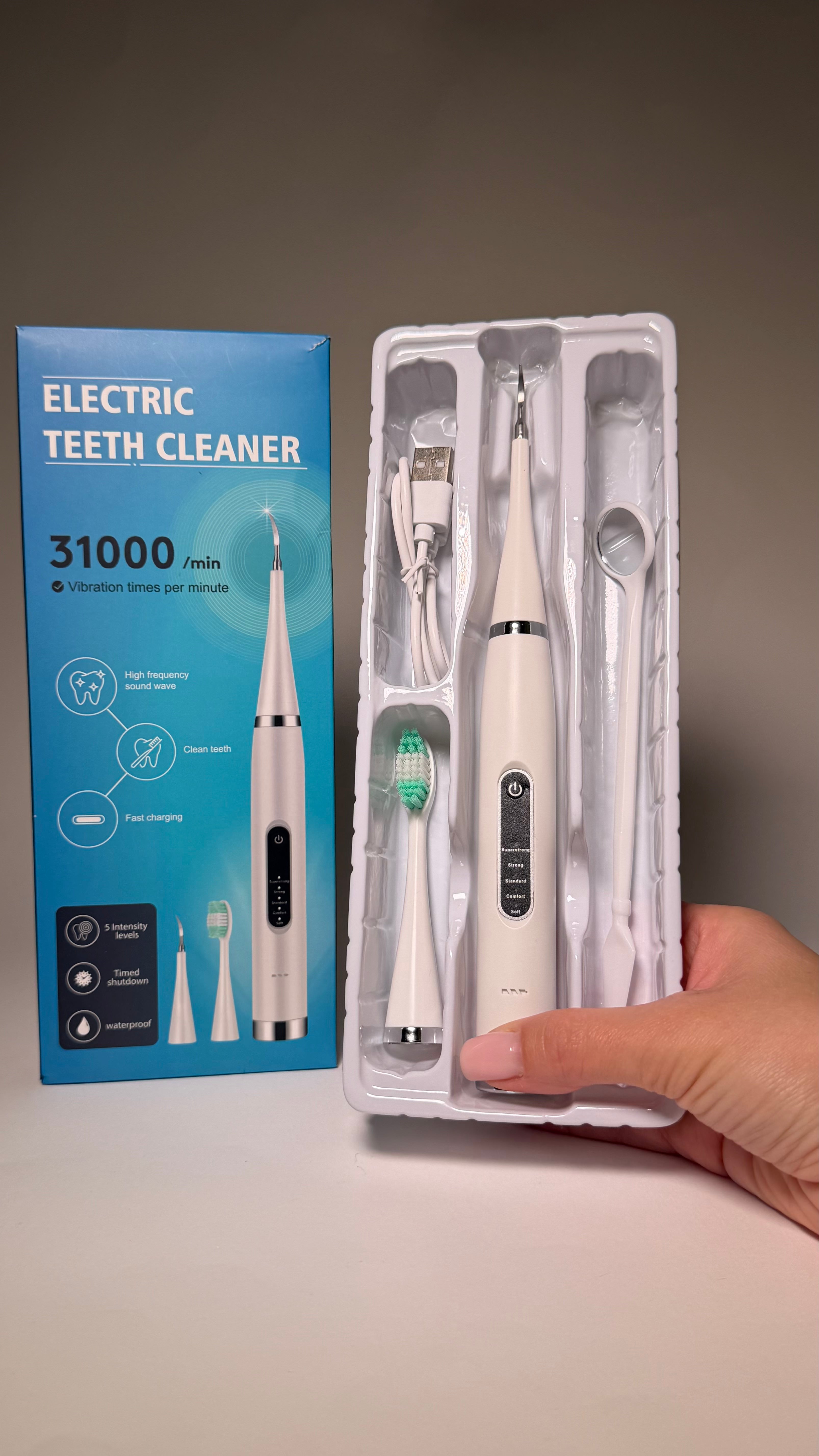 Aparat ultrasonic pentru curățarea dinților