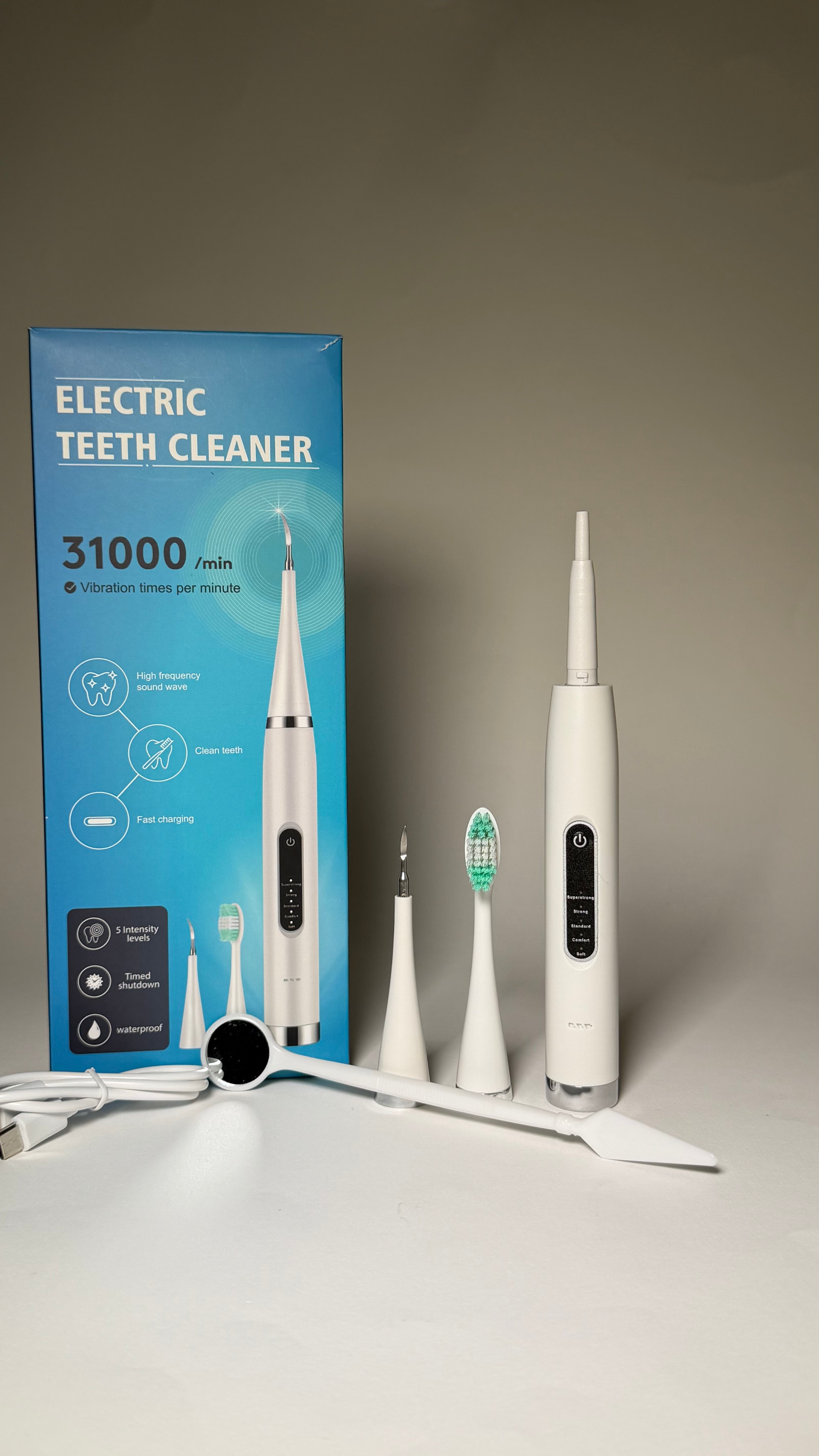Aparat ultrasonic pentru curățarea dinților