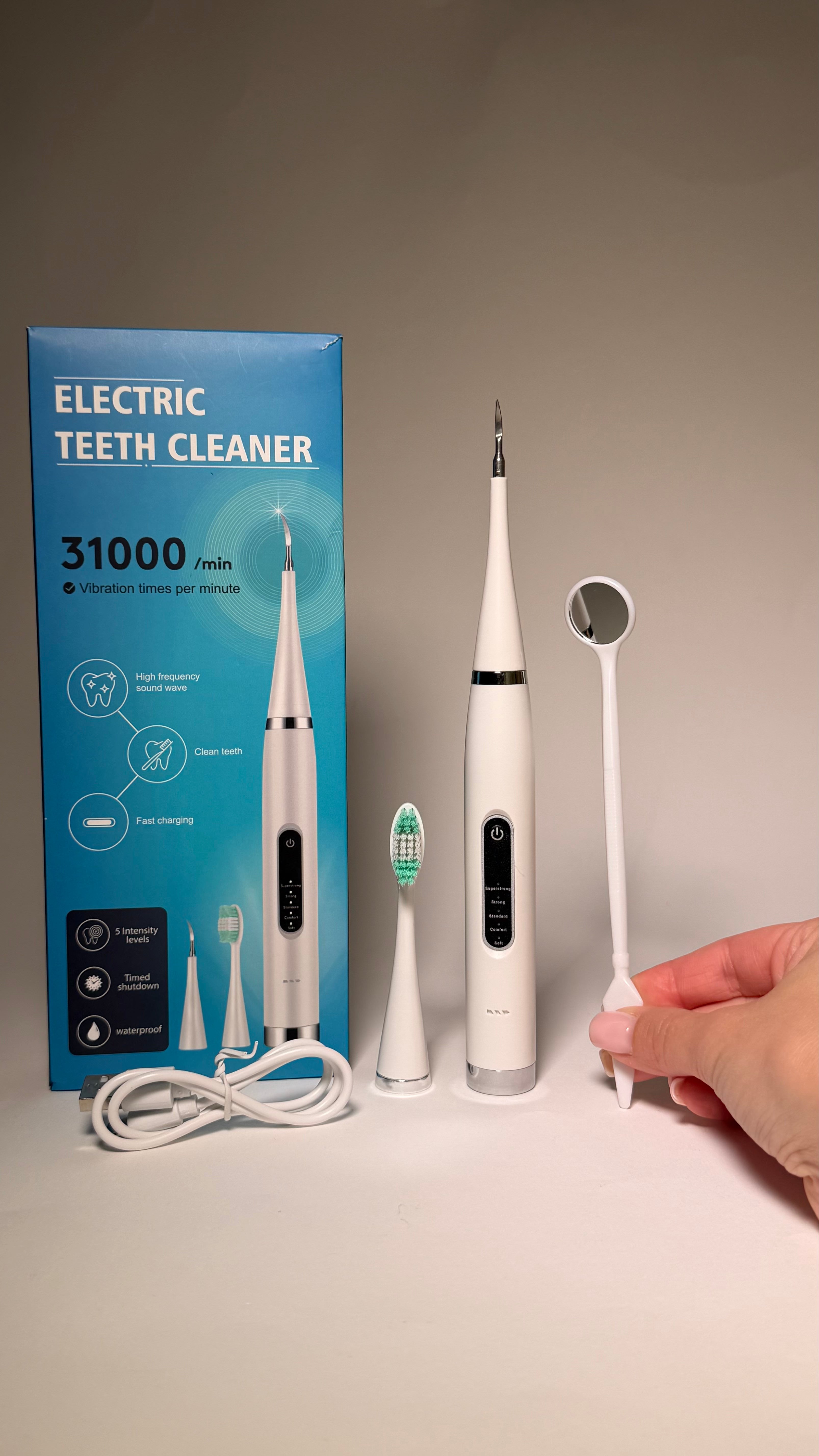 Aparat ultrasonic pentru curățarea dinților